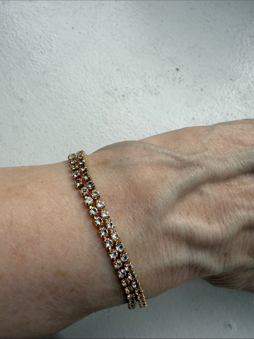 Monet Vintage Gold Plated Double Row Prong Set Rhinestone Tennis Bracelet.